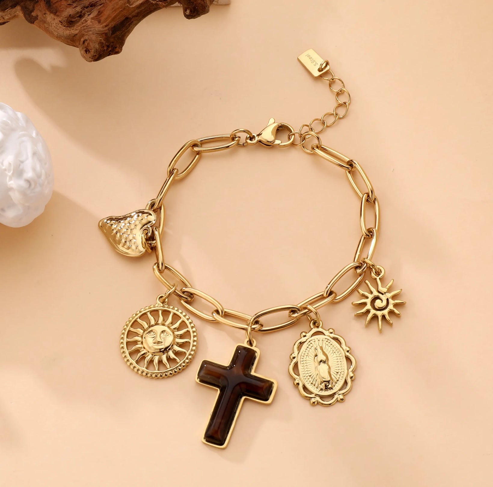 Gold Charm Bracelet with Sun, Cross, and Icon Pendants