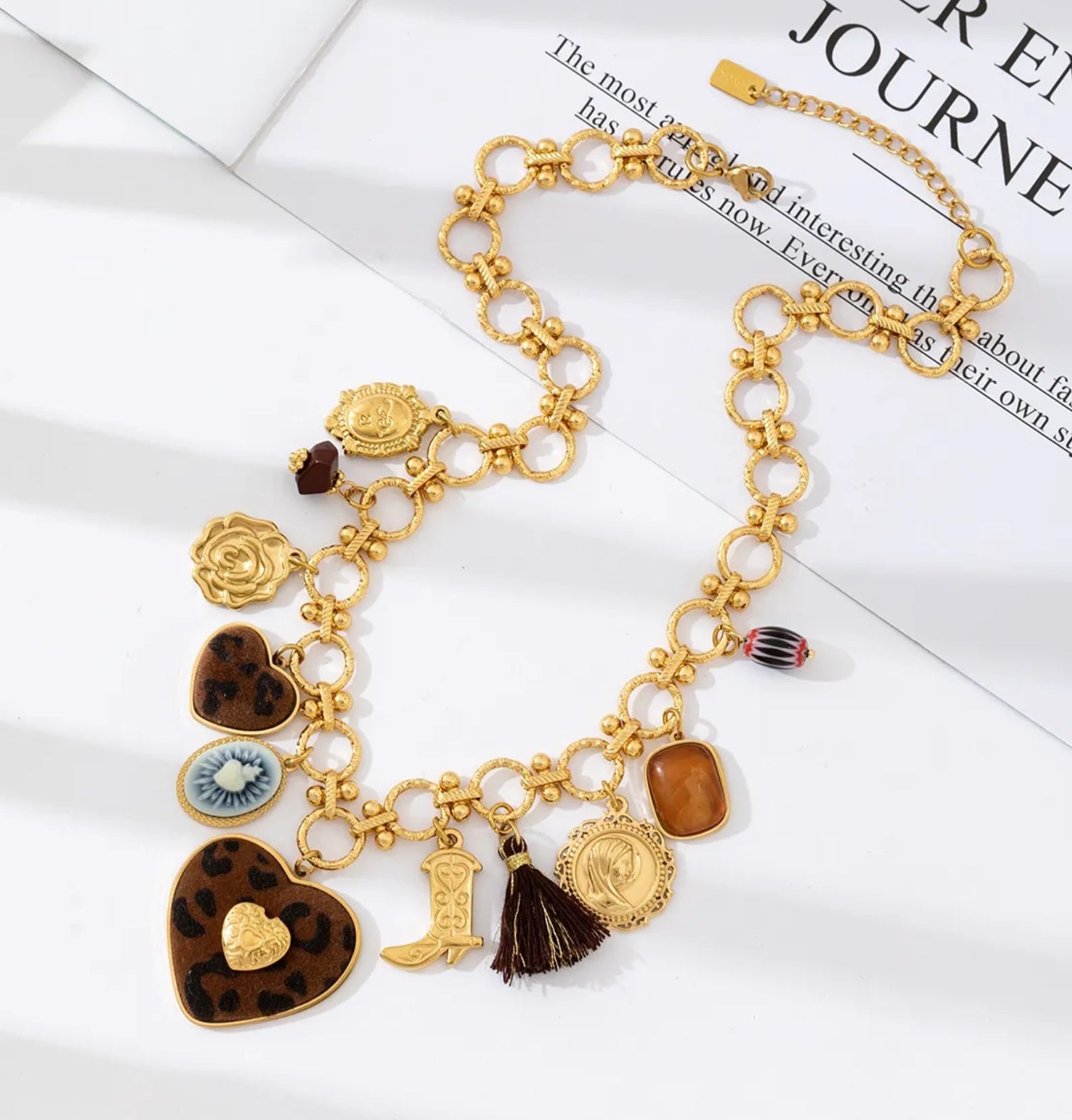 Gold Charm Necklace with Heart, Medallion & Tassel Accents | Eclectic Statement Jewelry