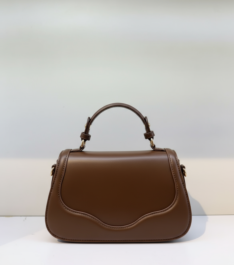 The Classic Curve Hand Bag – Timeless Charm, Modern Functionality