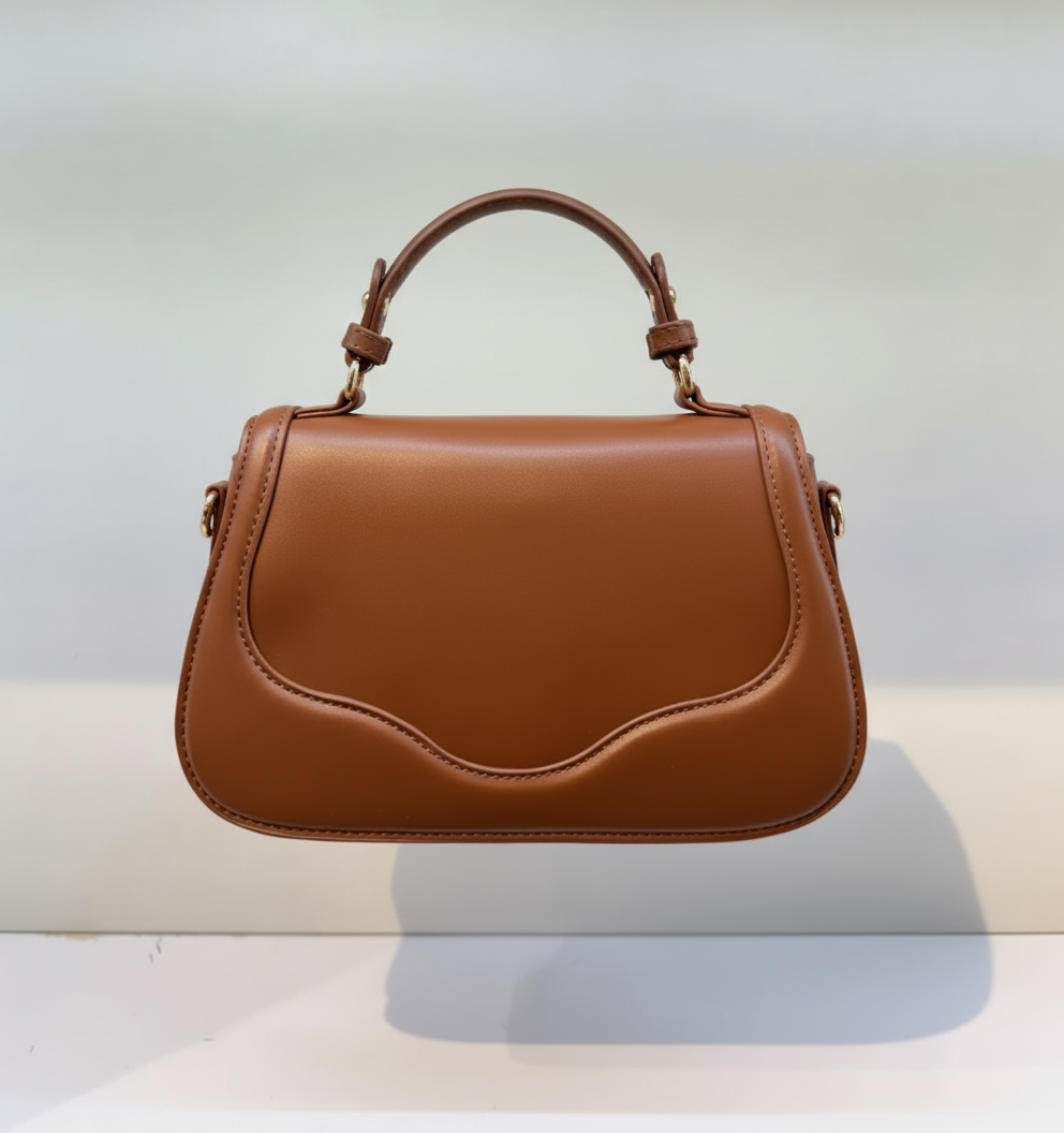 The Classic Curve Hand Bag – Timeless Charm, Modern Functionality